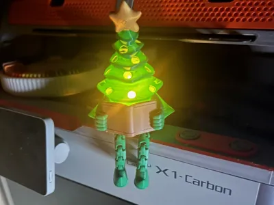 reading Christmas tree with tea light