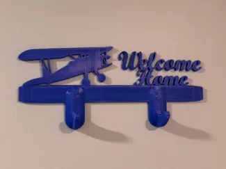 Perchero bienvenido a casa