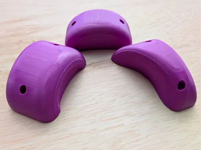Arc Pinches for Climbing Wall