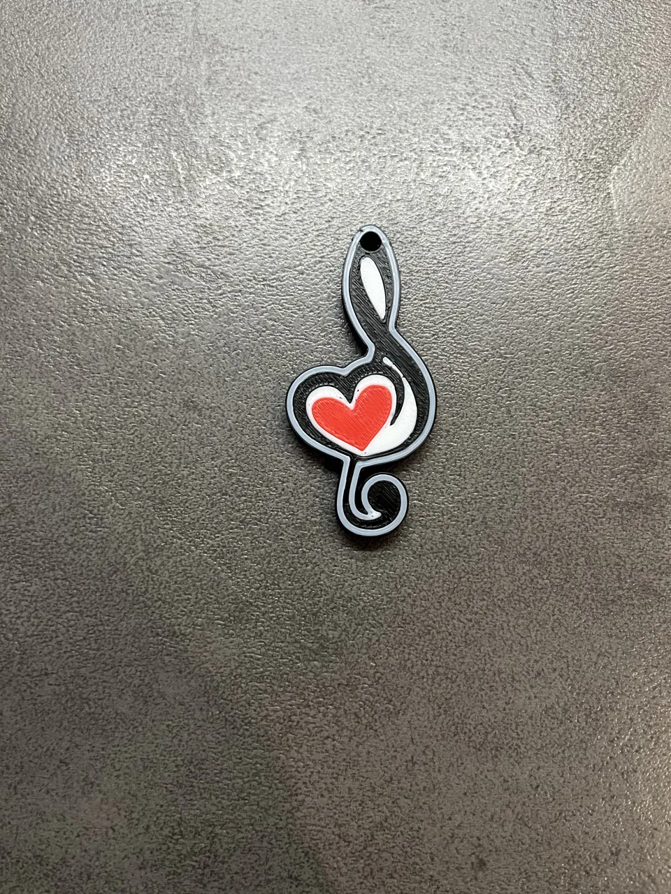 elegant treble clef earrings with a bold red heart view 2