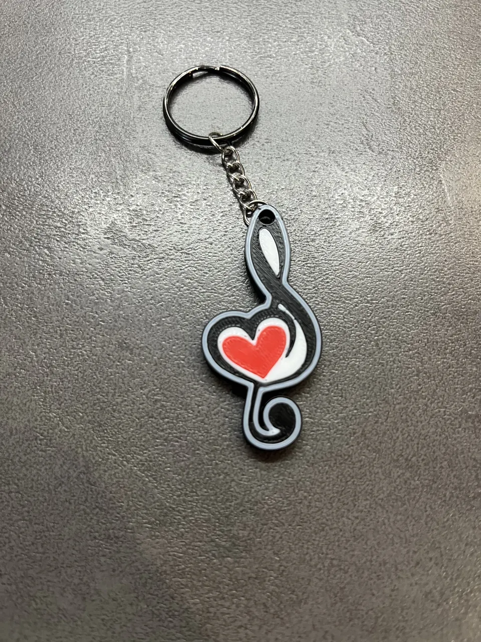 elegant treble clef earrings with a bold red heart view 4