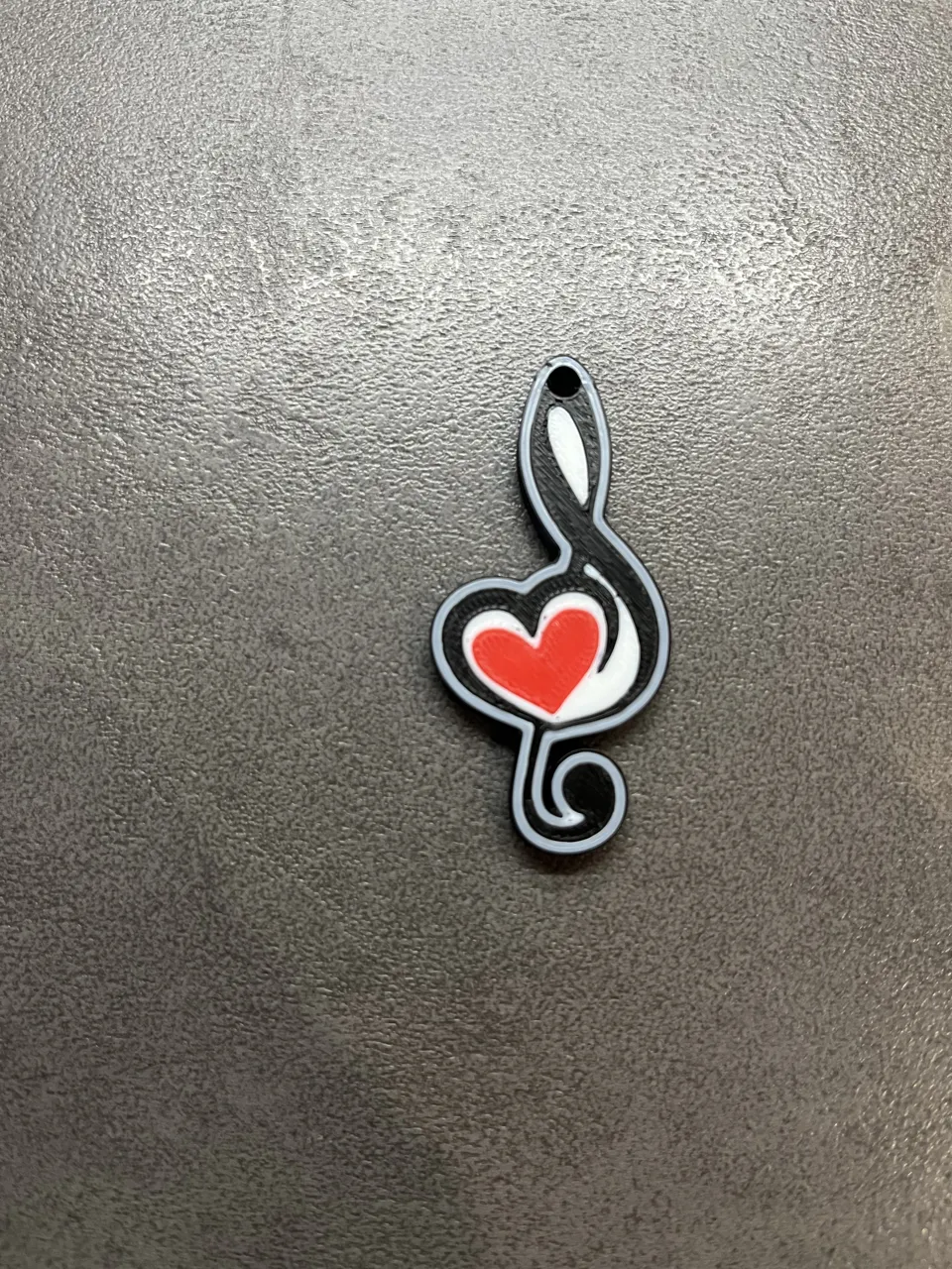 elegant treble clef earrings with a bold red heart view 3