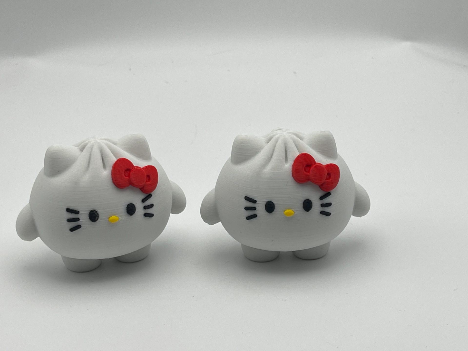 Miniatura 1 do modelo 3D 可爱的包子Hello Kitty 凯蒂猫钥匙扣挂件 AMS多色打印