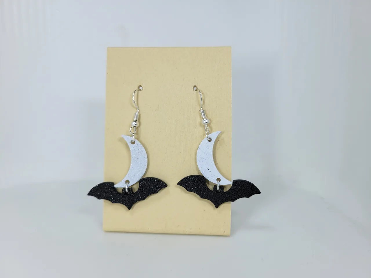 Moon and bat earrings view 2