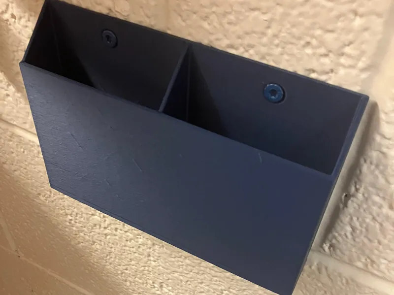 Wall mounted phone holder