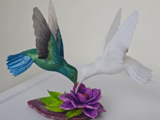Hummingbird with flower