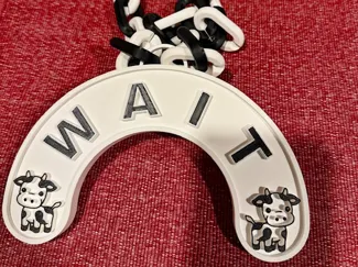 A necklace with a cute Cow that makes no sense