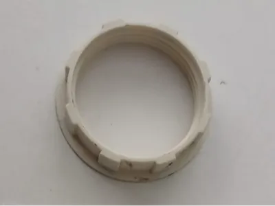 Nut for attaching a lampshade