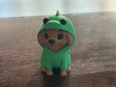 Dog in a dinosaur costume