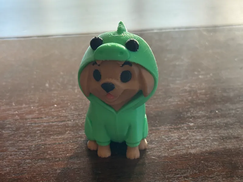 Dog in a dinosaur costume