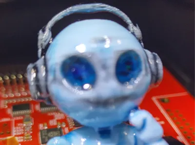 My Robot "Mini-Me" with head phones, creative mood