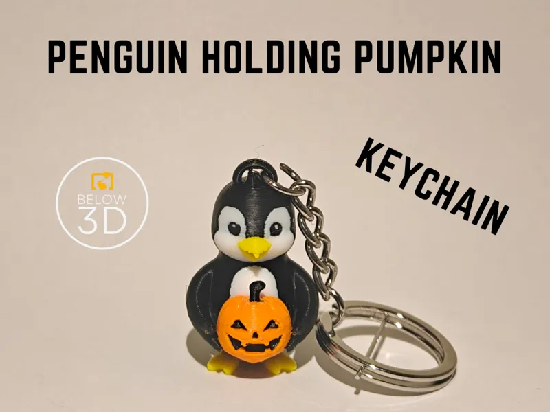 Penguin Holding Pumpkin Keychain