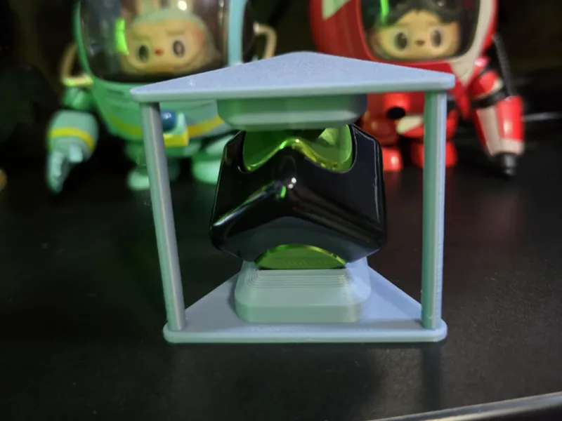Hour glass style fidget cube holder