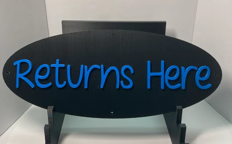 Returns Here Sign