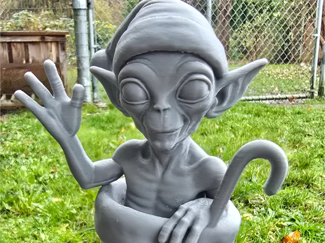 Alien in boot with candycane