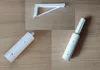 Holder for rod or tube, as well as reinforced wall mount