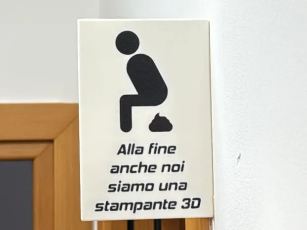 Insegna WC divertente