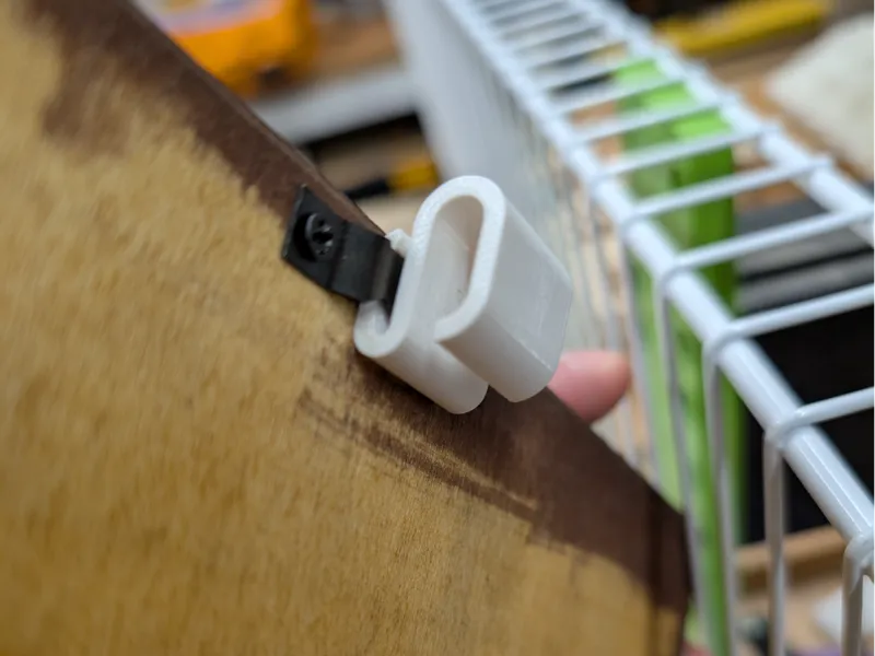 Hook for attaching frames to grid wall