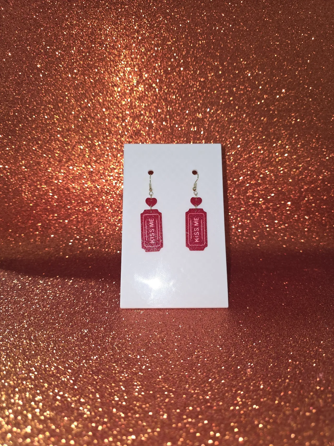 Kiss ticket earrings view 2