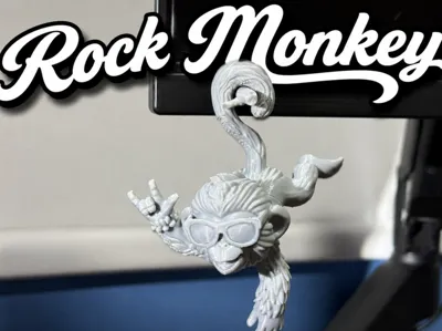 Rock monkey for hanging