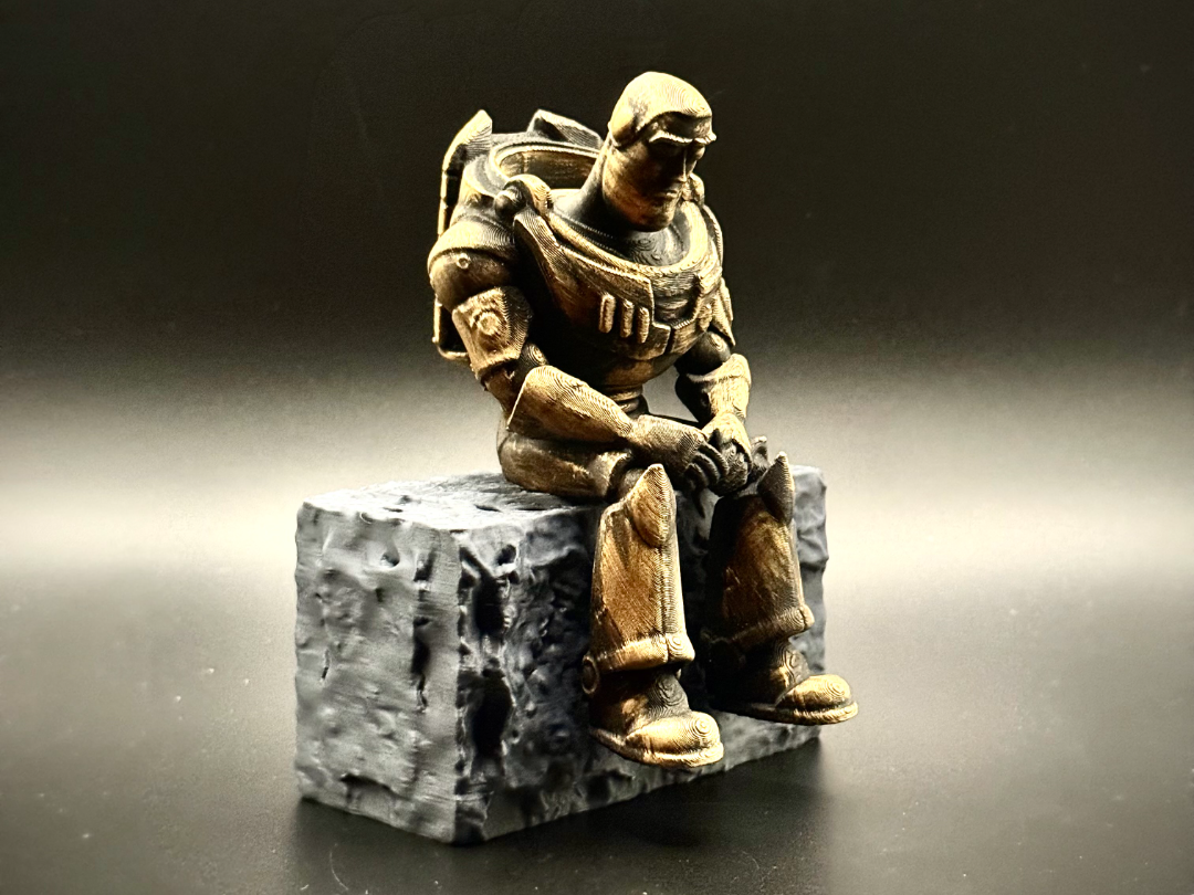 Sad Buzz Lightyear figurine sitting on a ledge!
