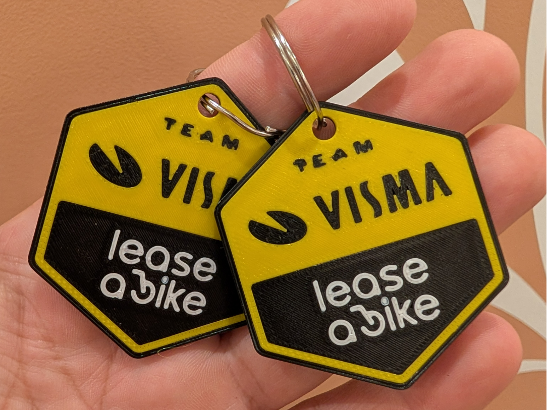 TEAM VISMA LEASE A BIKE keychain