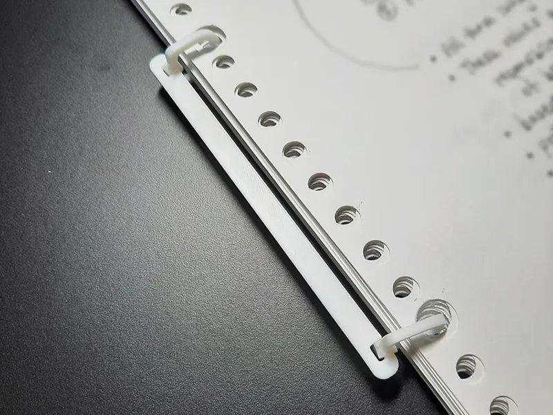 Thin-spine 2-ring binder for loose leaf paper