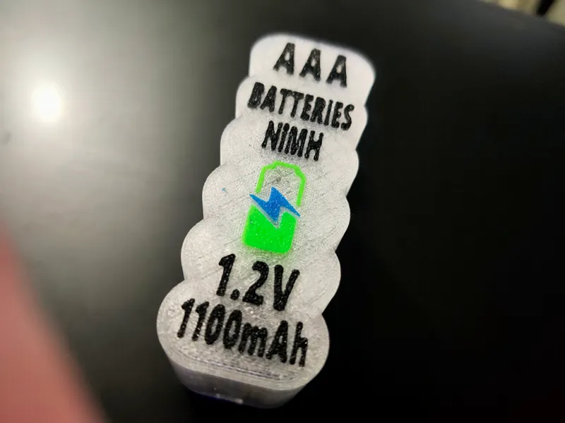 AAA BATTERY HOLDER WITH TEXT LID FOR HONEYCOMB STORAGE WALL
