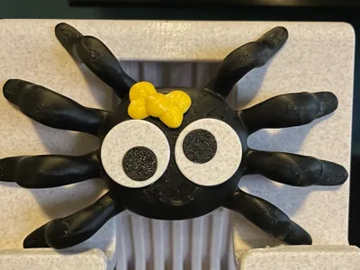 Silly spider with bow 