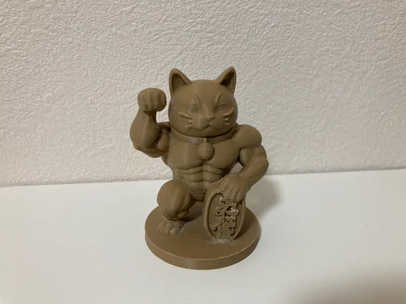 Muscular lucky cat figurine