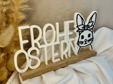 Frohe Ostern Schriftzug Mit Hasenkopf und Kontur