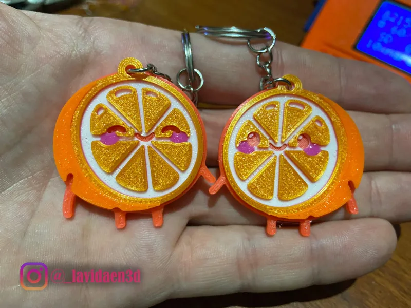 Llavero naranjas enamoradas