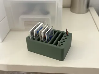 Storage for sewing machine needle boxes & needles