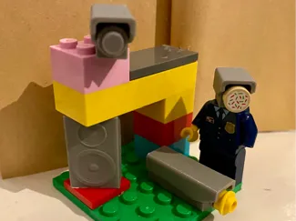 Brick compatible camera and speaker head