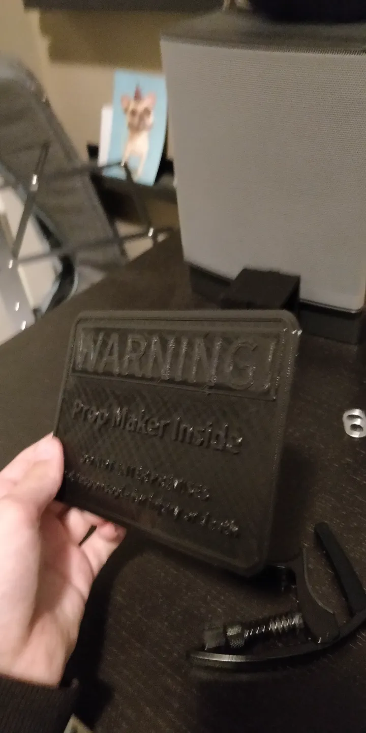 prop maker warning sign
