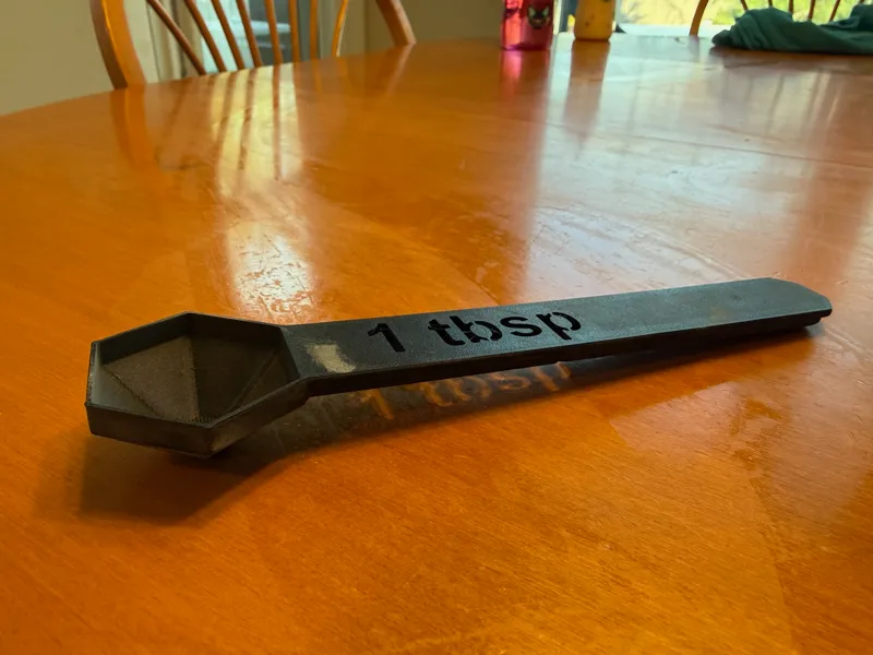 1 Tbsp scoop fits in Costco Fiber Container