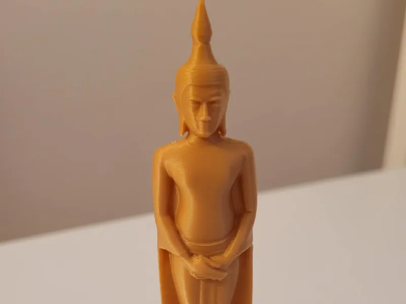 Small standing budda