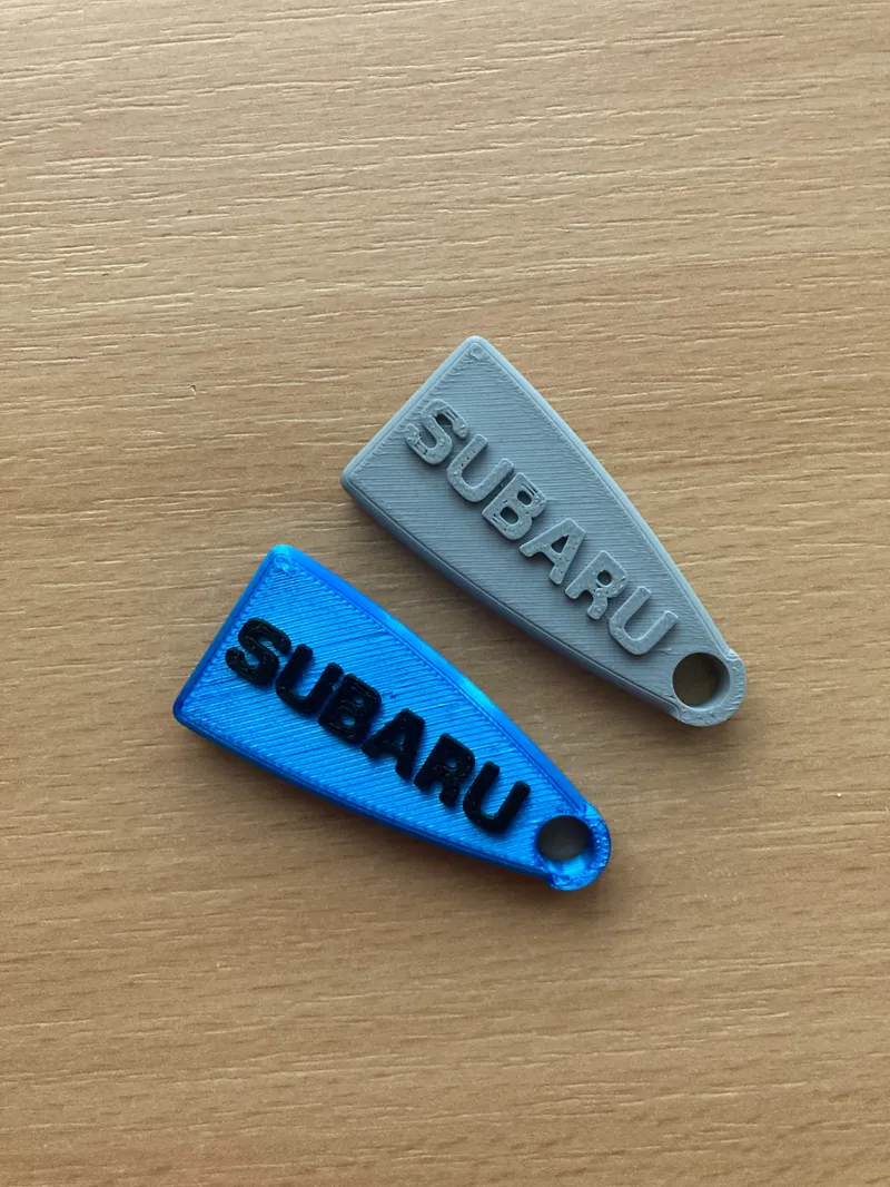 Subaru Can-opener keychain, beer can-opener