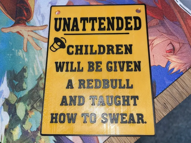UNATTENED YELLOW SIGN 
