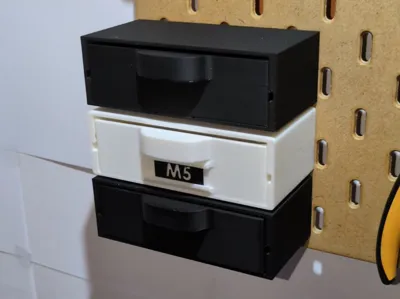 Skadis tilt drawer for bolts