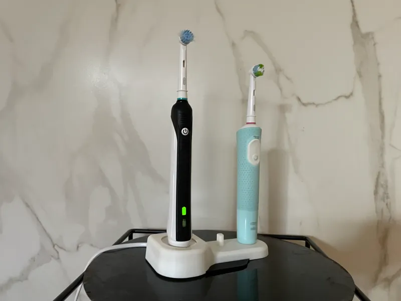 Toothbrush charger and stand