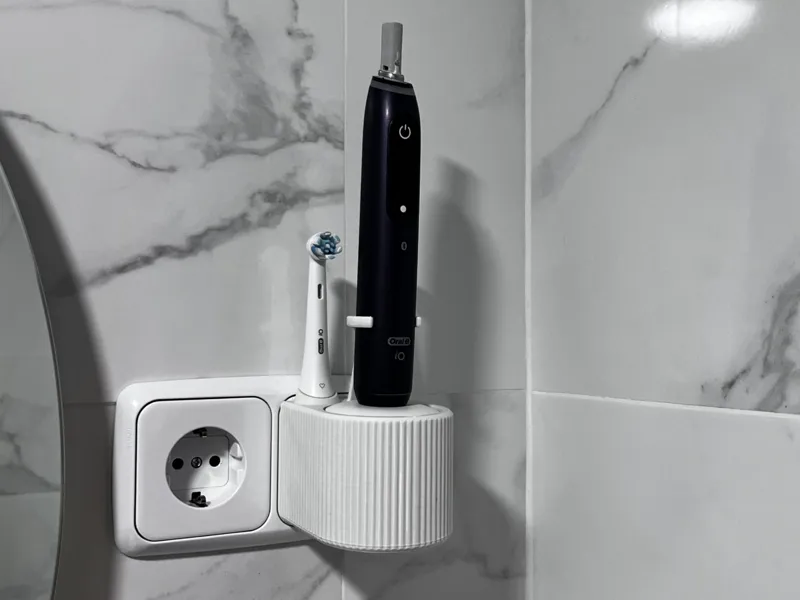 Oralbio charging stand with 2 cleaning heads