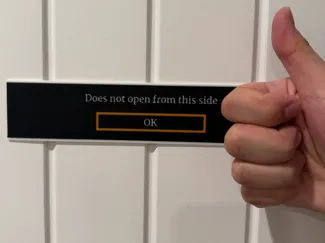 "Does not open from this side" Sign