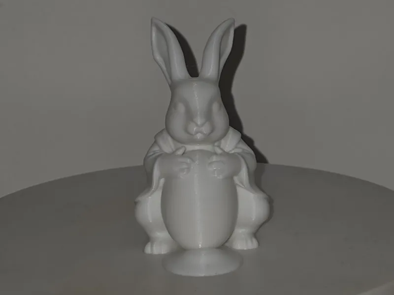 Easter Rabbit holding big Egg