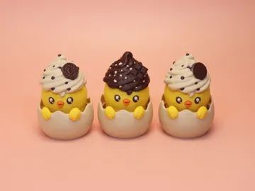 Objeto manipulable: Swirl Hatchling Egg Clicker Fidget Toy — vista de referencia 3