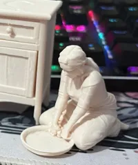 Figurine femme pétrissant la pâte — photo 4