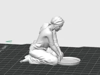 Figurine femme pétrissant la pâte — photo 1