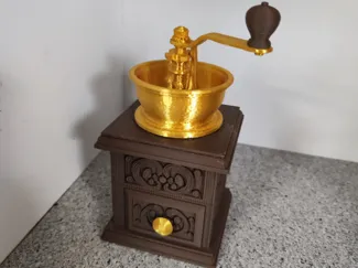 Alte goldene Kaffemühle Deco No Ams