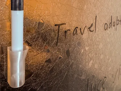 Wall-mounted marker holder