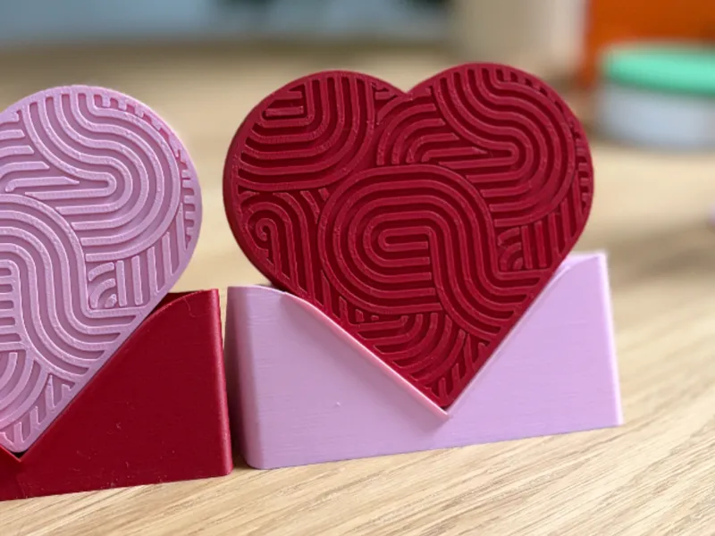 Heart coasters with modern contour pattern